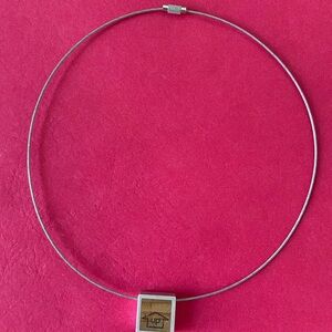 Elegant Silver Necklace with Wooden Accent